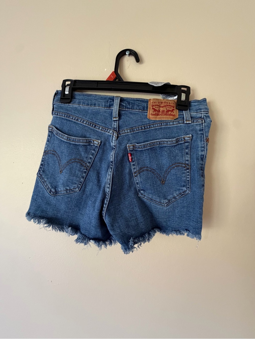 Levi's Medium Blue Denim Cutoff Shorts with Frayed Hem